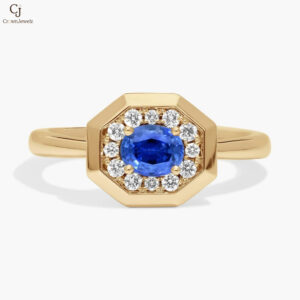 East-West Oval Cut Blue Sapphire and Pavé Diamond Ring In 14K Yellow Gold