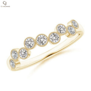 Vintage Inspired Bezel-Set Diamond Fashion RingA radiant row of round diamonds, each framed in delicate milgrain detailing, creates a timeless sparkle across this elegant band. Set in warm yellow gold, the design blends vintage charm with modern grace. Perfect for stacking or wearing solo, it’s a refined symbol of everlasting brilliance.
